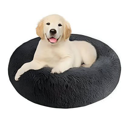 Vista lateral de cama para perro grande gris oscuro mostrando el relleno suave